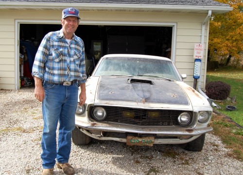 John Grafelman proudly stands by his historic Mustang John Grafelman proudly stands by his historic Mustang